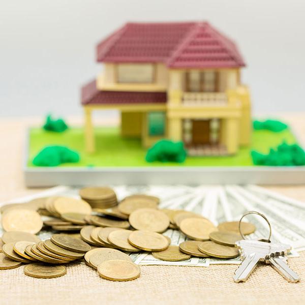 Planning savings money of coins to buy a home concept for proper